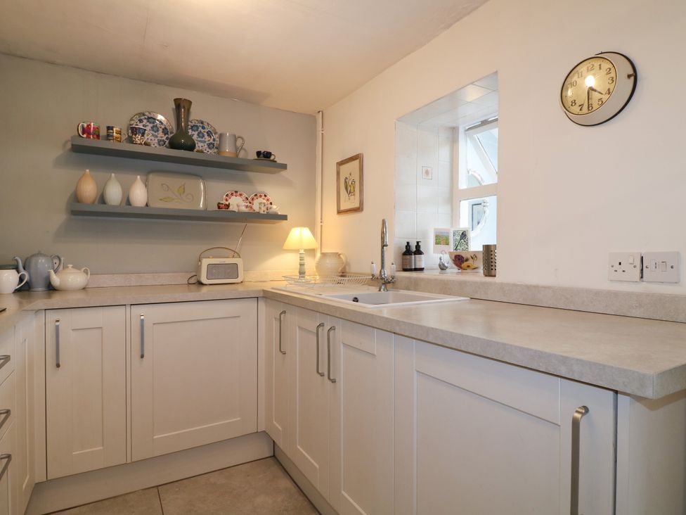 A kitchen with a sink and countertop at Sunnyside in Elton