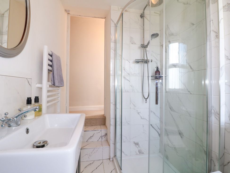 A bathroom with a shower and sink at Sunnyside in Elton