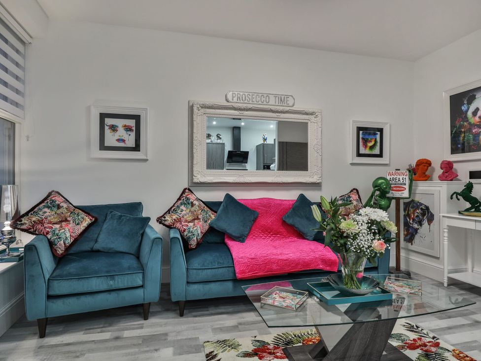 A living room with a couch and coffee table at 1 Bed Flat - Sleeps 2 - Parking - Wifi, Scarborough