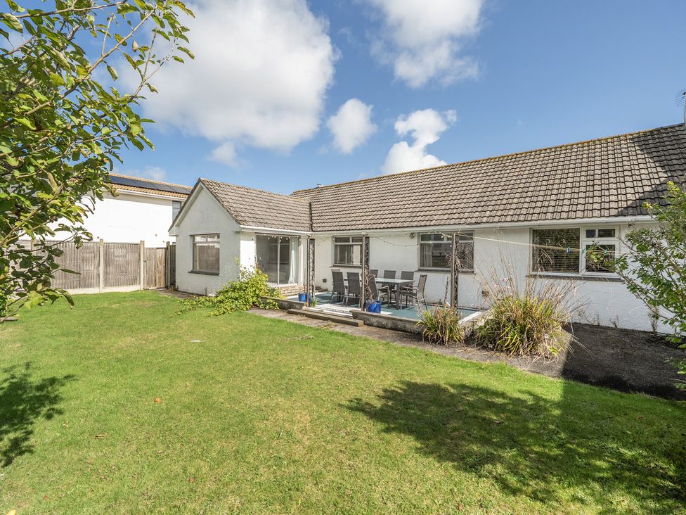 A house with a garden and patio at Sleeps 9 KingBeds Family Friendly, Pityme near Penmayne