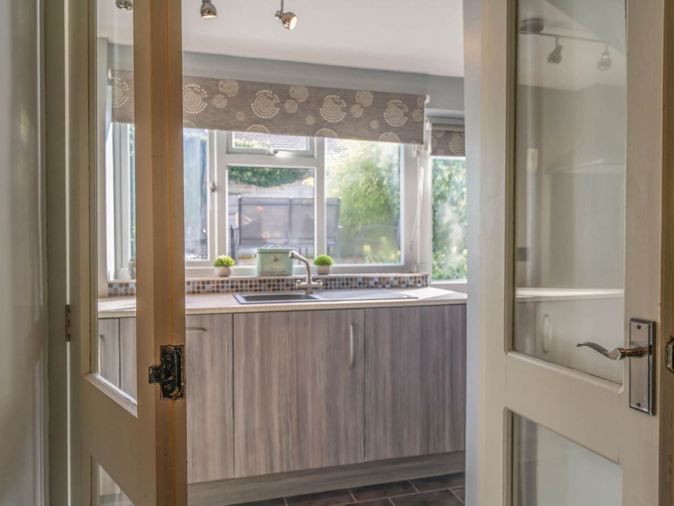 A kitchen with a countertop and sink visible at Cosy cottage near scenic walks and country pub in Penrith