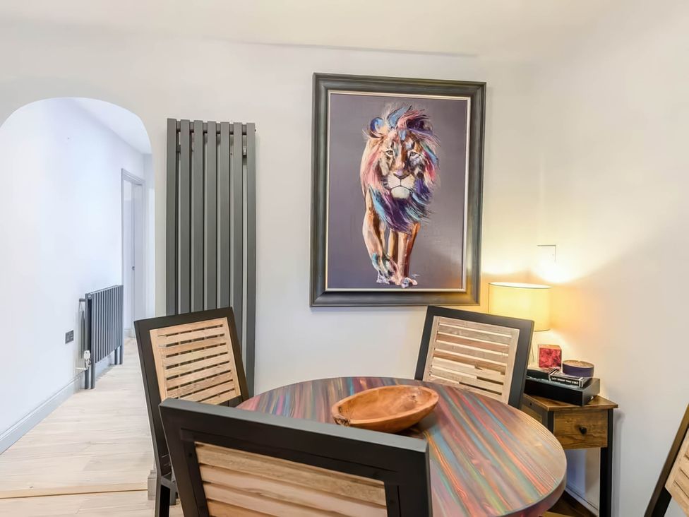A dining room with a table and chairs at Luxury 2 bedroom Lodge in rural lincolnshire