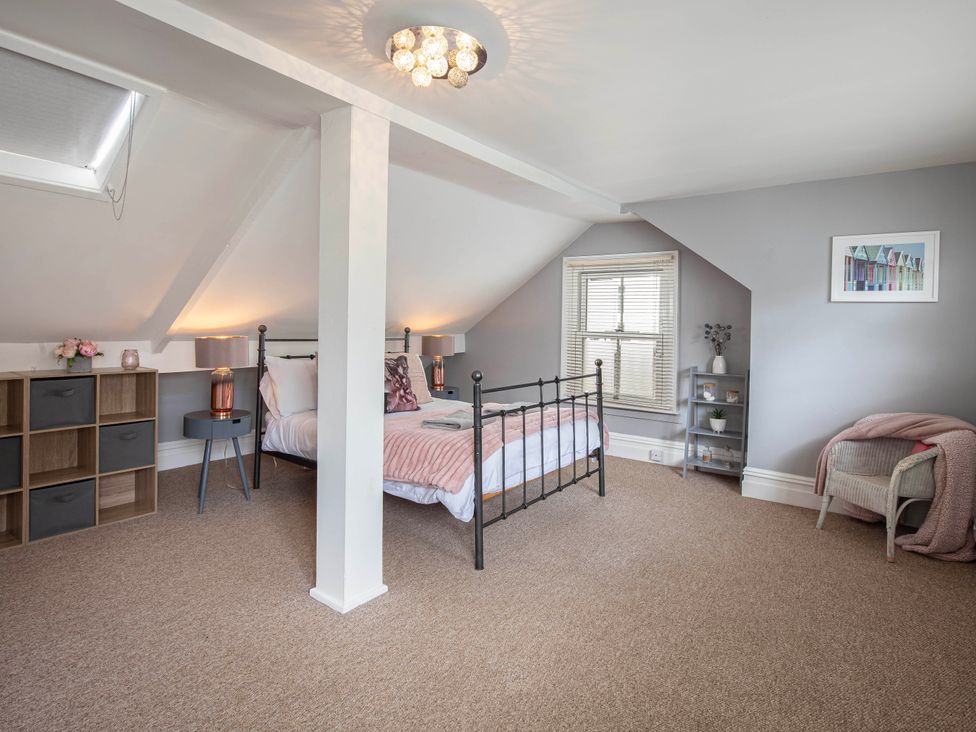 A bedroom with a bed and storage unit at Cottage Sleeps4  PetFriendly  Garden  ByBeach in Lytham St Annes