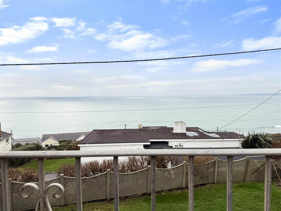 A view of the sea from a property balcony at Porthleven Coastal Retreat with 5 Bedrooms Porthleven