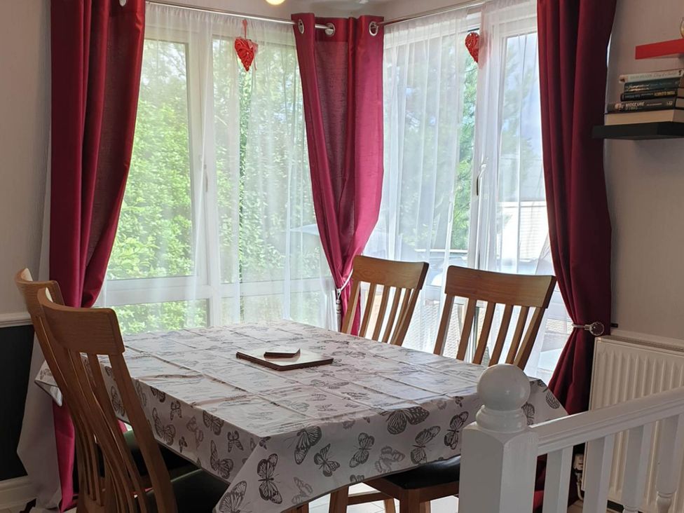 A dining room with a table and chairs at the property in Fleetwood