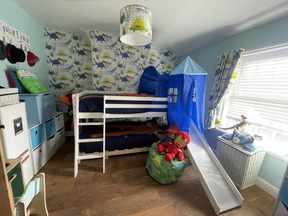A bedroom with a bunk bed and toys at Immaculate 3Bed House in Bridgnorth