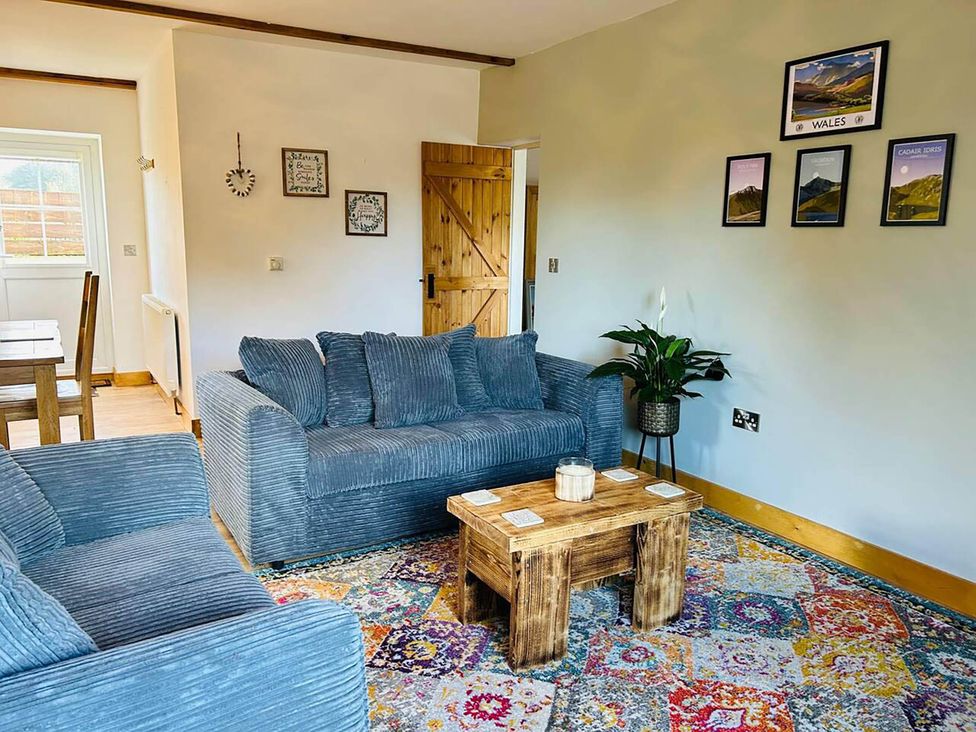 A living room with a sofa and coffee table at 