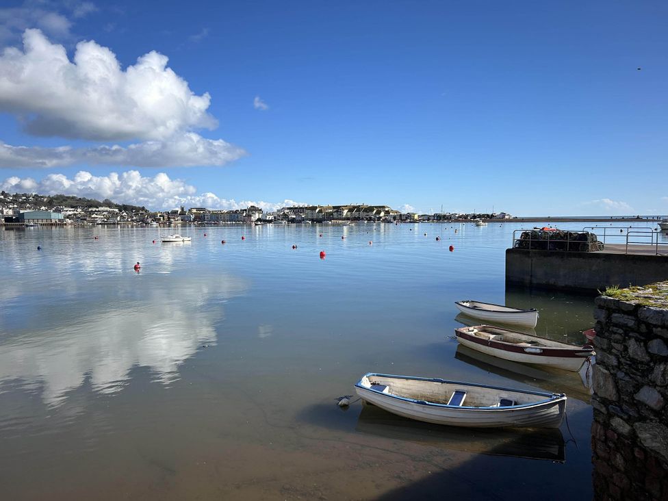 A view of boats on water under a blue sky at Newton Abbot