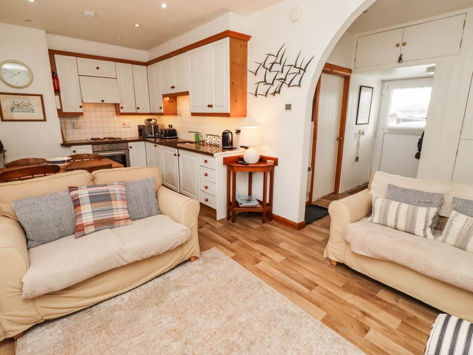 A kitchen with seating area in an open layout at Spinnaker