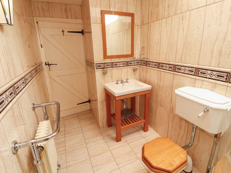 A bathroom with sink and toilet at Claybottom Farm near Hesket Newmarket