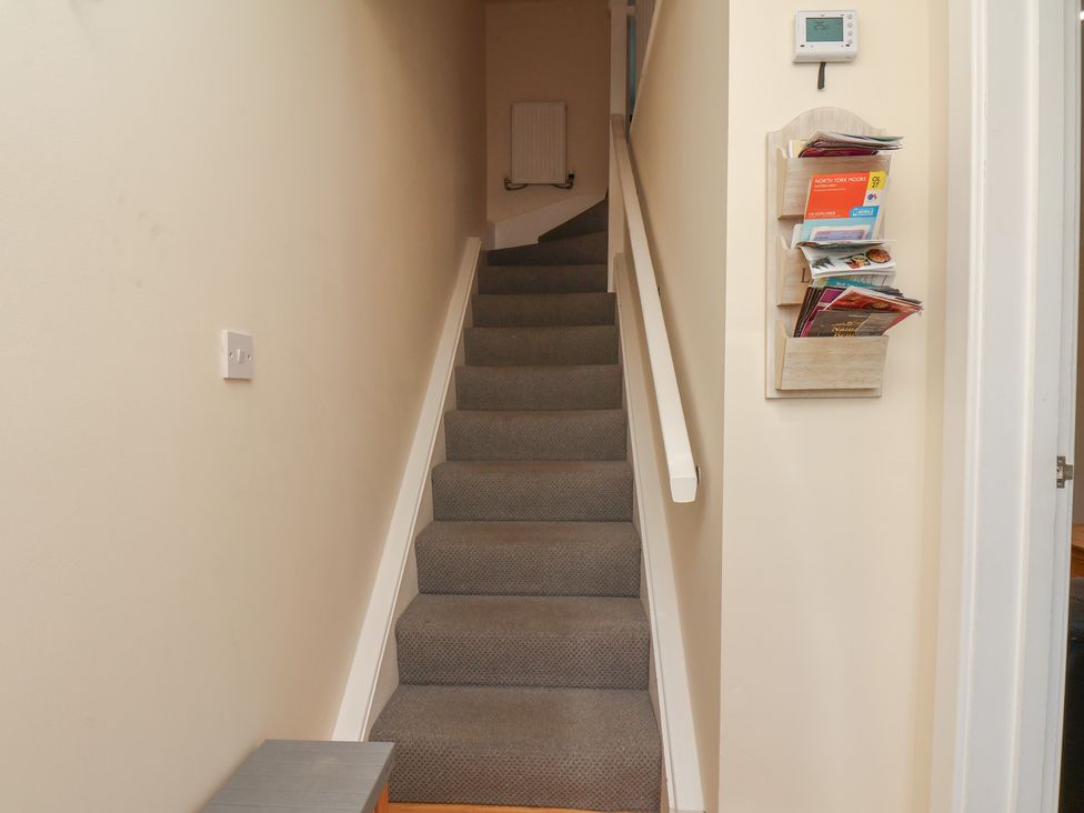 A staircase leading upstairs in The Cosy Haven in Malton