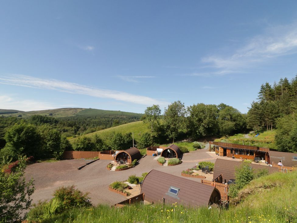 A view of glamping pods and gardens at Gortin Glen Glamping Pod 3 in Omagh