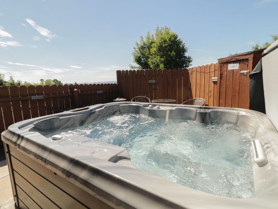 A hot tub in an outdoor area at Gortin Glen Glamping Pod 4 in Omagh