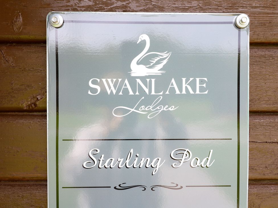 A sign for Starling Pod at Swanlake Lodges in Coalville