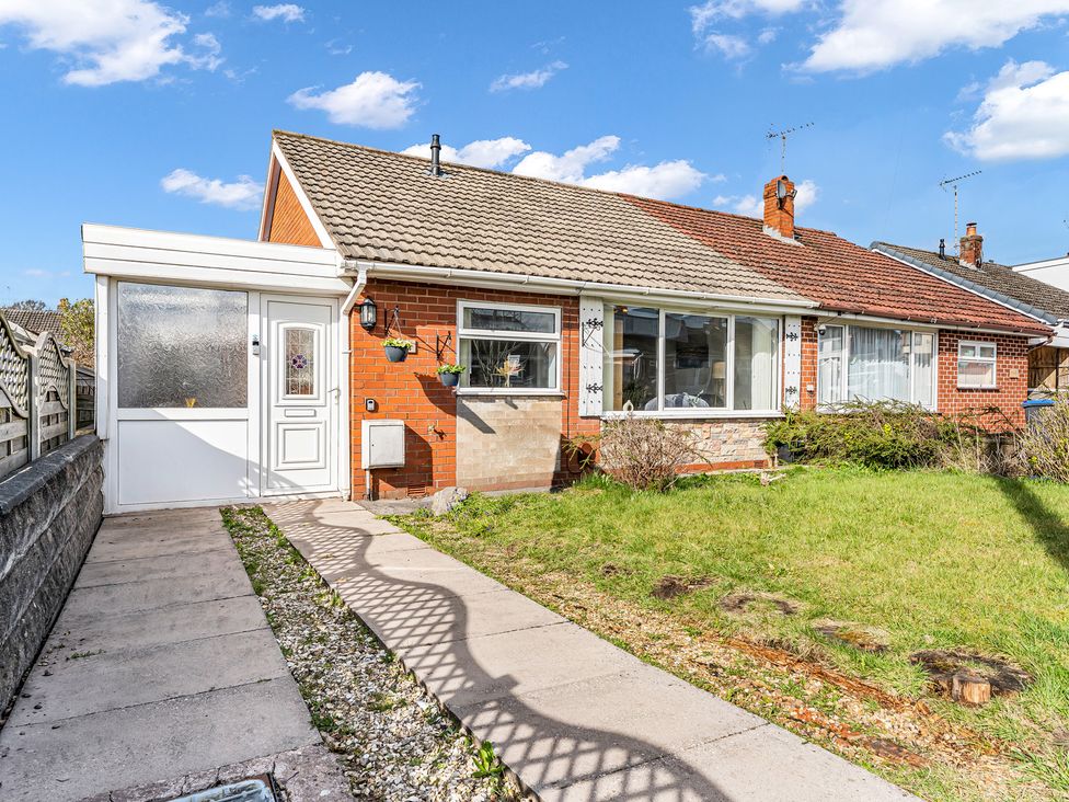 A bungalow with a front door and pathway at Mallory House in Stoke-on-Trent