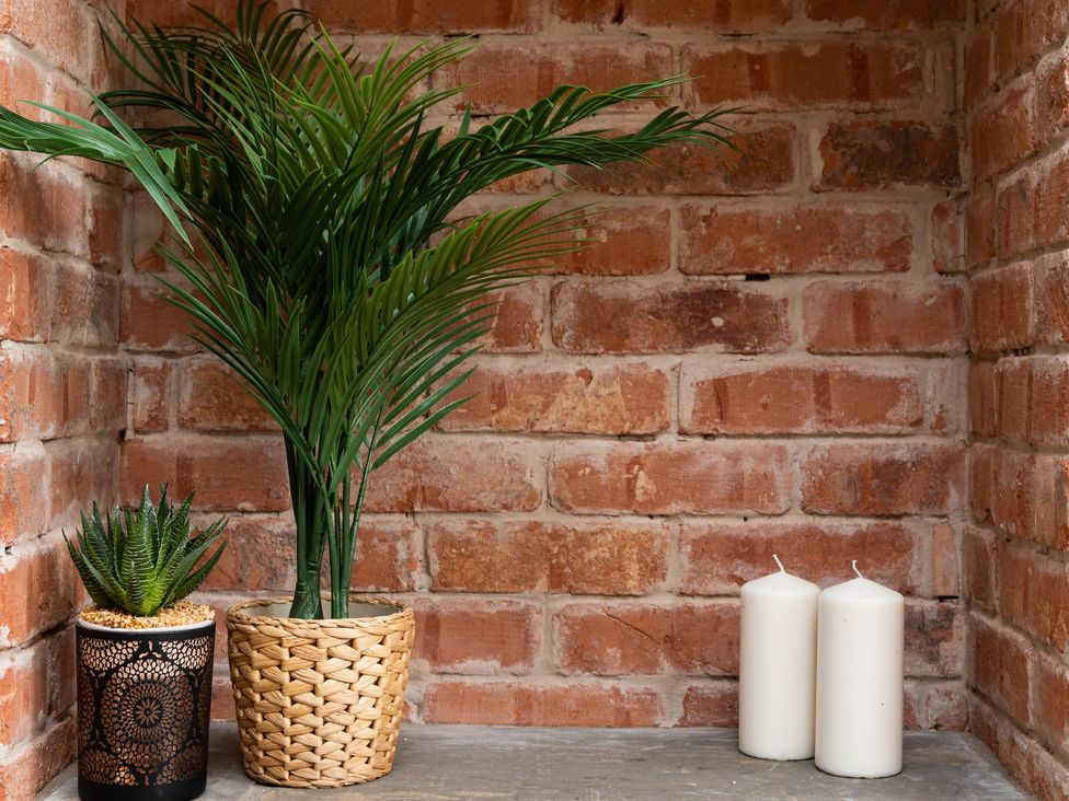 An arrangement of plants and candles at 38 Ashville Avenue in Scarborough