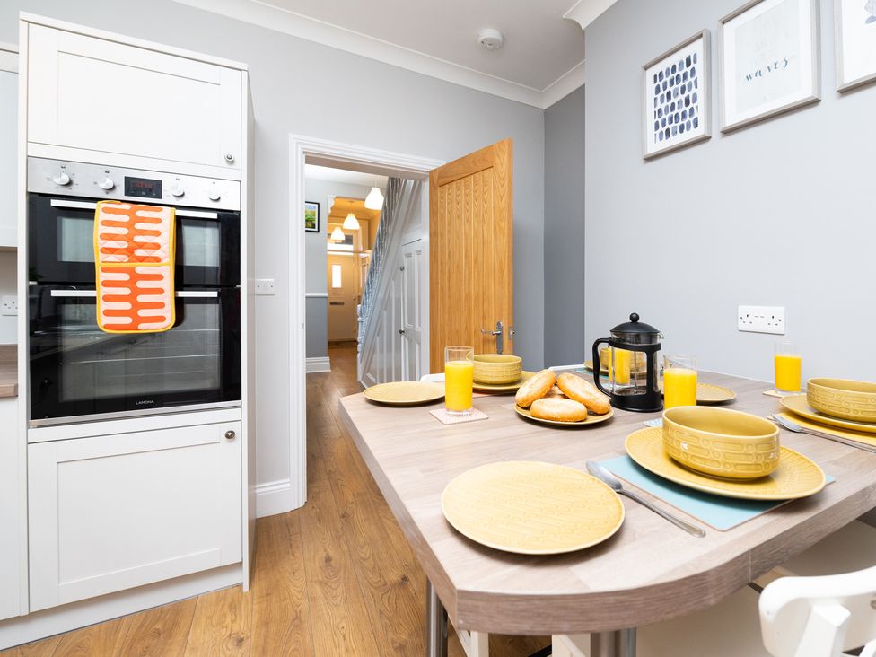 A kitchen with an oven and breakfast items at 38 Ashville Avenue Scarborough