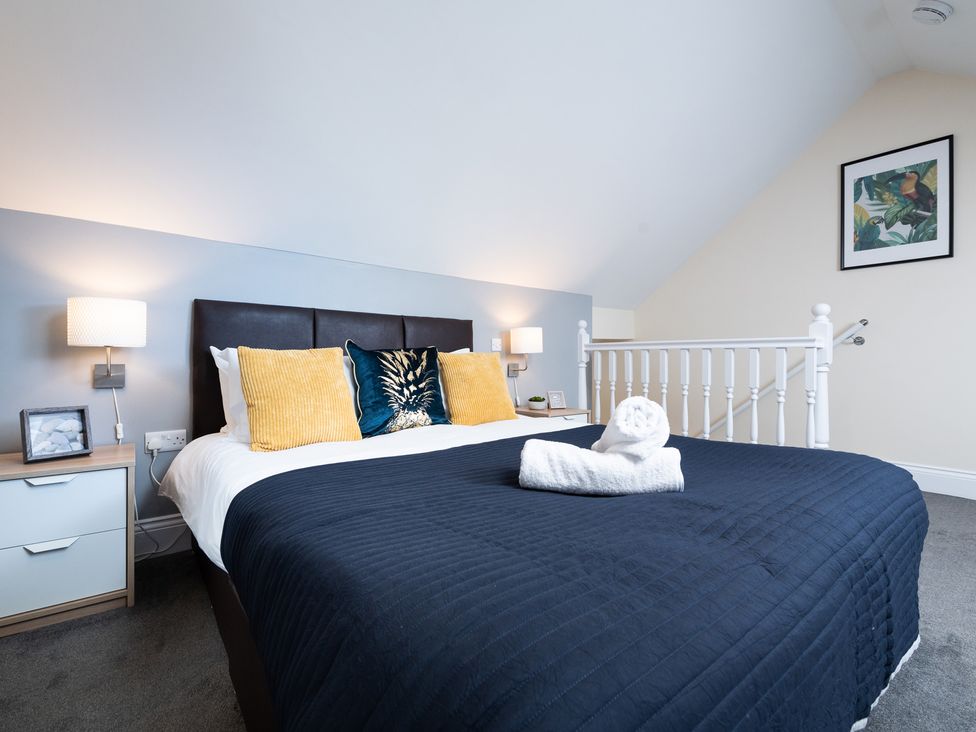 A bedroom with a bed and bedside tables at 38 Ashville Avenue Scarborough