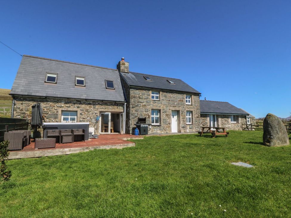 A house with patio furniture and garden at Cefnbron in Caernarfon