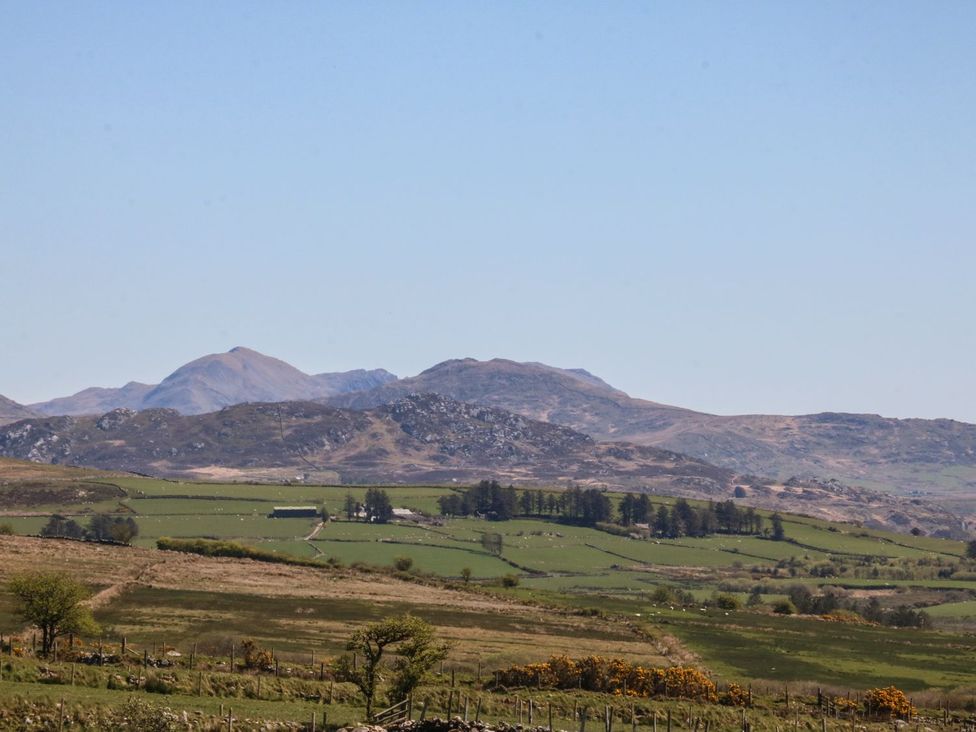 A view of mountains and fields at Cefnbron in Caernarfon