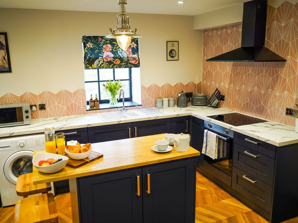 A kitchen with a sink and countertop at The Old Mill Great Bolas near Telford