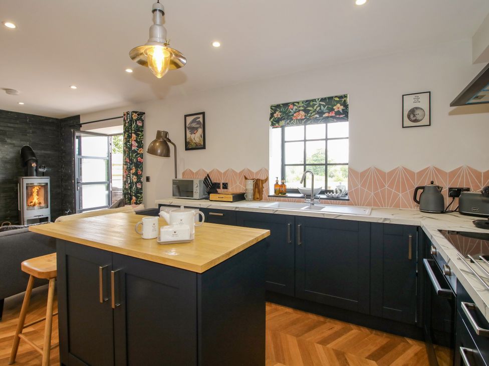 A kitchen with countertop and sink at The Old Mill Great Bolas near Telford