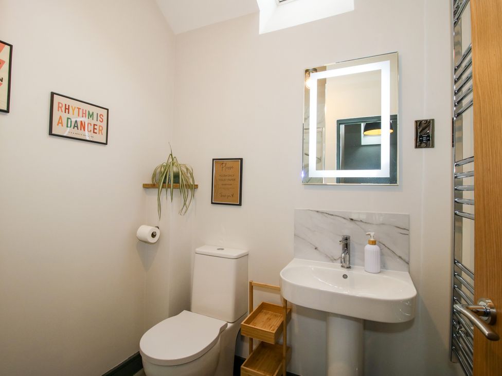 A bathroom with a sink and toilet at The Old Mill Great Bolas near Telford
