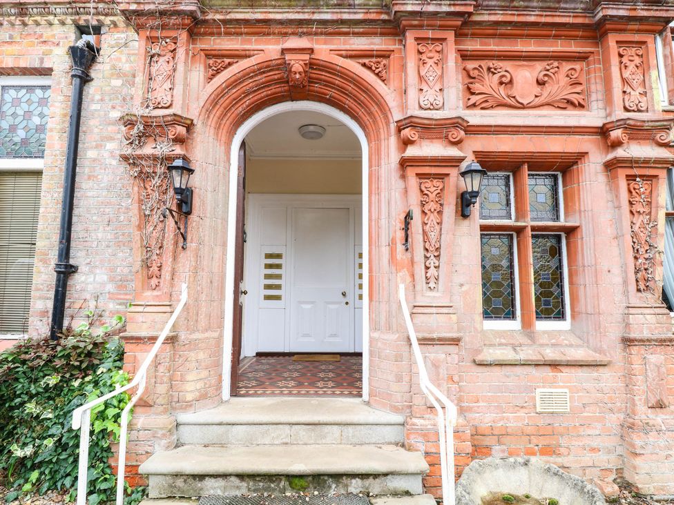 An entryway with a front door and stairs at 10 Uplands Court in Brundall