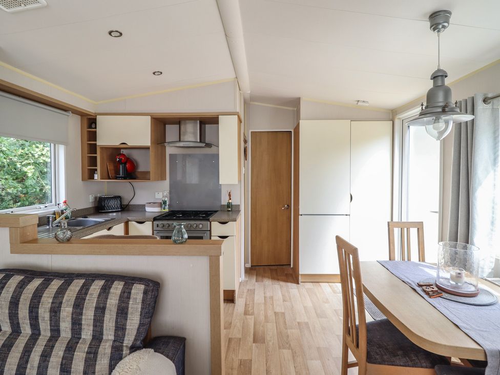 A kitchen with a dining area at Plot 13A
