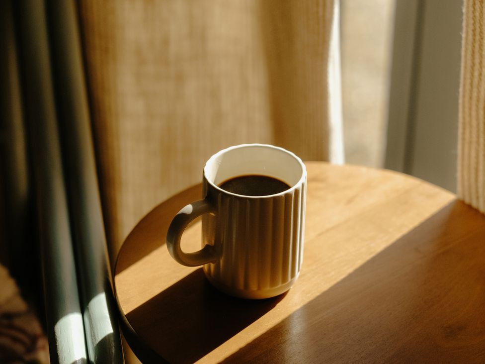 A cup of coffee on a table at Baldslow Barn in Battle near Hastings