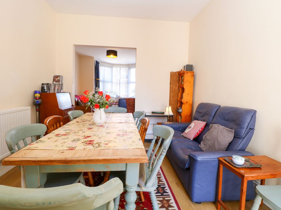 A dining room with a table and chairs at 33 North Denes Great Yarmouth