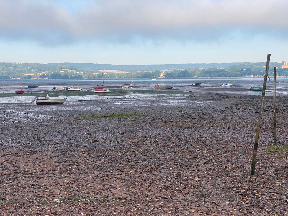 An area with boats on water at low tide at Tower View Cottage in Lympstone