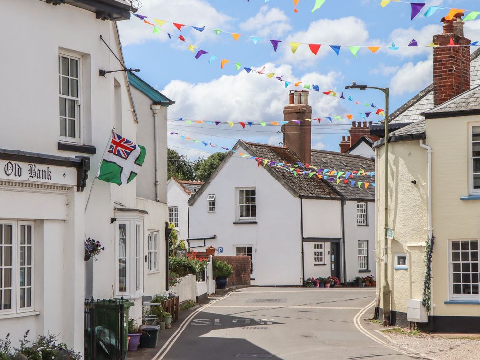 A street view with buildings and decorations at Tower View Cottage in Lympstone