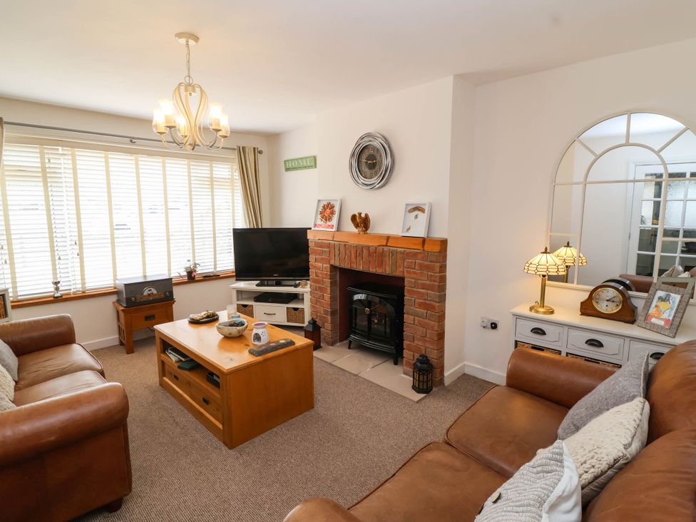 A living room with furniture and decor at 56 Steart Gardens Burnham-on-Sea