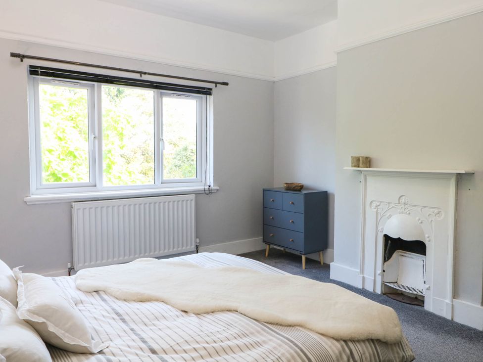A bedroom with a bed and chest of drawers at 41 Terminus Avenue Bexhill-On-Sea