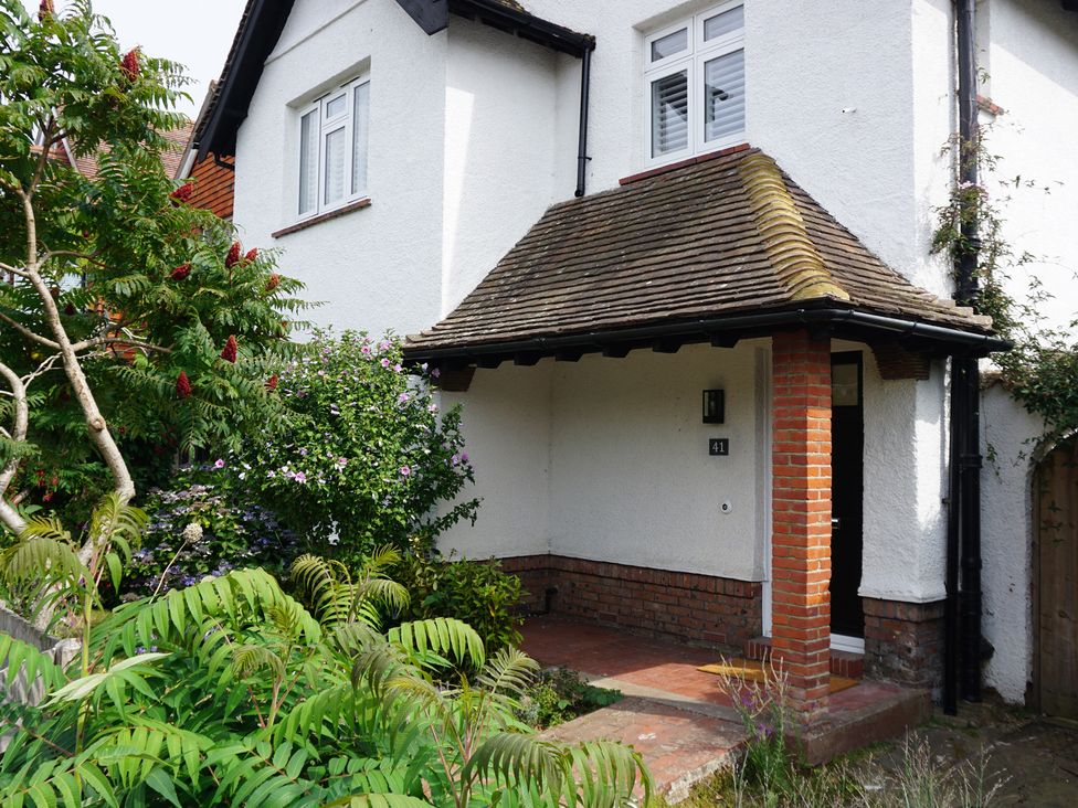 A front porch of a house with greenery at 41 Terminus Avenue Bexhill-On-Sea
