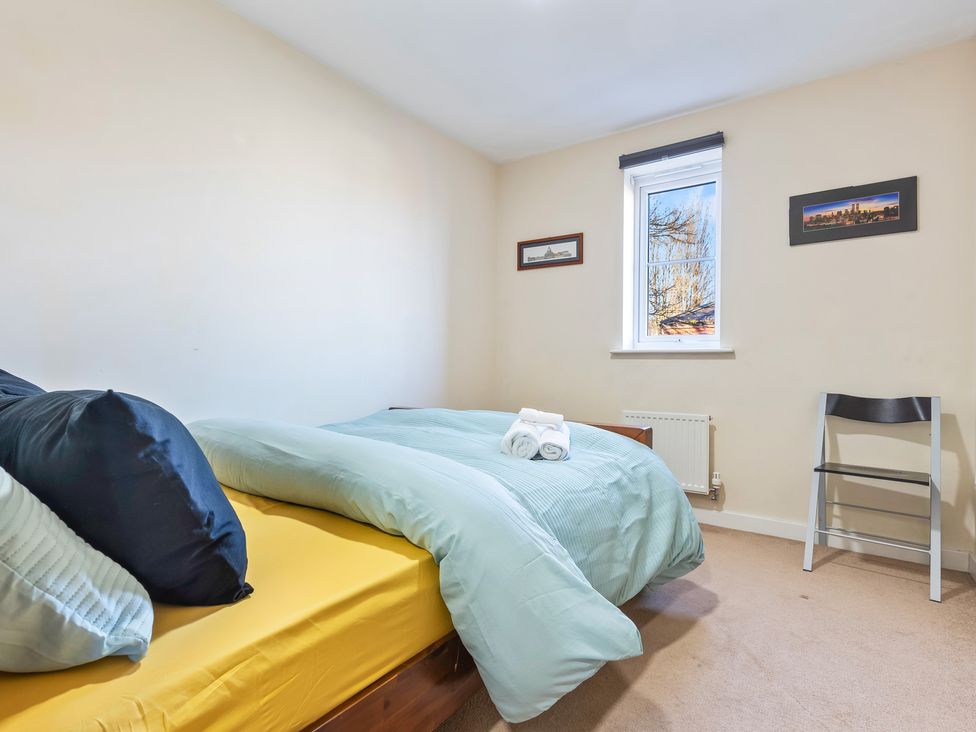 A bedroom with a bed and window at Flat 34 Herbert James Close in Birmingham