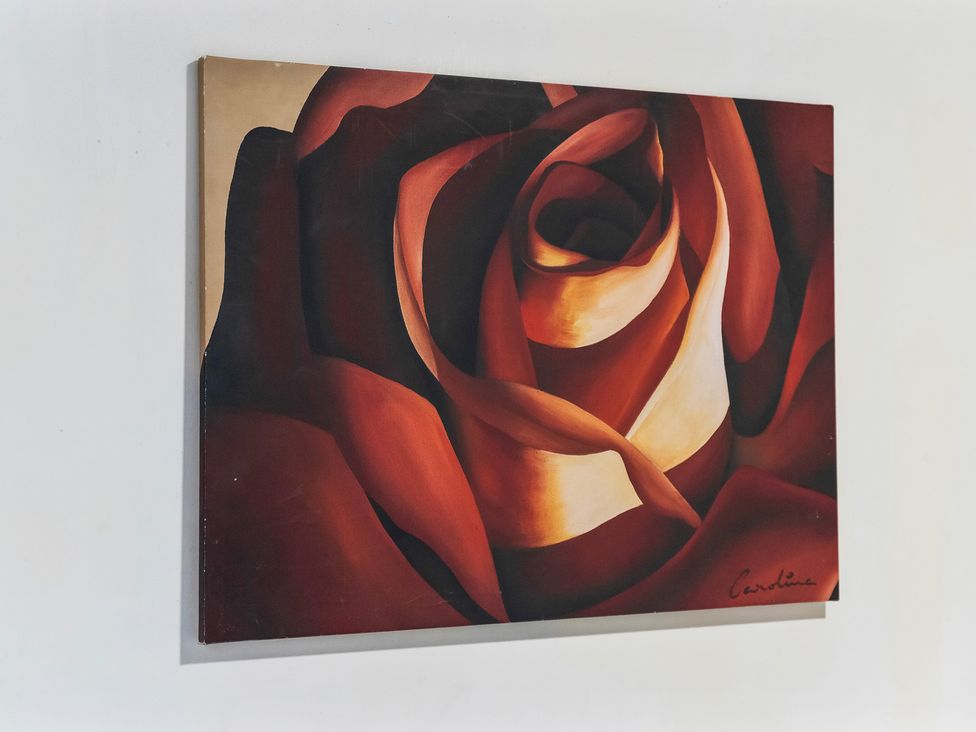 A rose painting on a wall at Flat 34 Herbert James Close in Birmingham