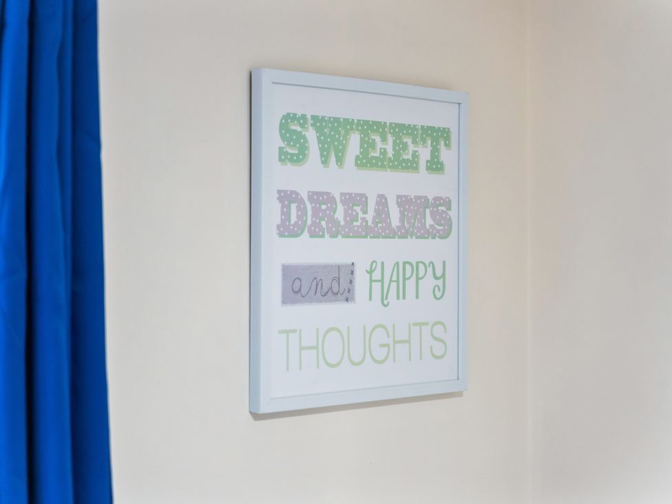 A framed wall art in a bedroom at Flat 34 Herbert James Close Birmingham