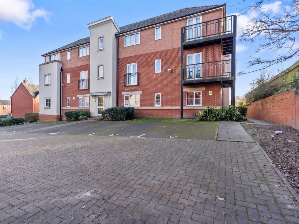 An apartment building with balcony and parking spaces at Flat 34 Herbert James Close Birmingham