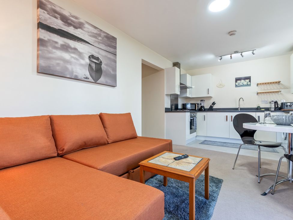 A living room with a sofa and coffee table at Flat 34 Herbert James Close Birmingham