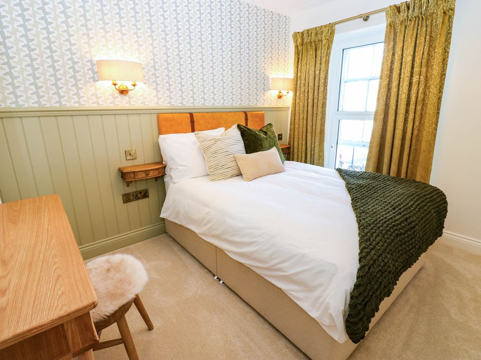 A bedroom with a bed and desk at Bishops Quarter - Barrington, Bishop Auckland