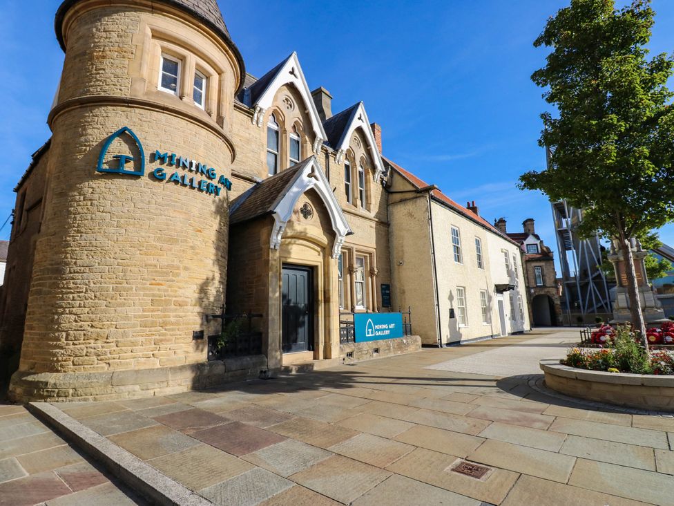 A building exterior with signage at Mining Art Gallery in Bishop Auckland