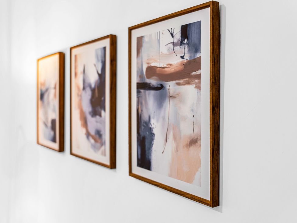 Three framed art pieces on a wall at Victoria House, Stoke on Trent