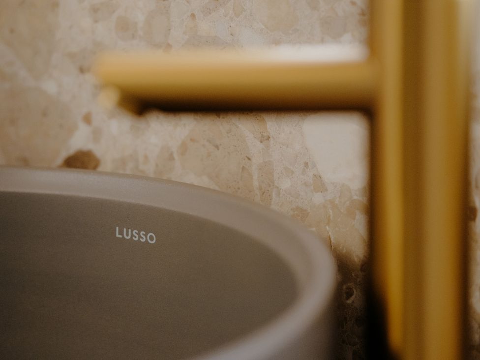A sink with faucet in a bathroom at Baldslow Stables in Battle near Hastings
