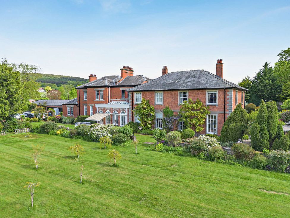 A house with gardens and a lawn at Staunton Park in Leominster