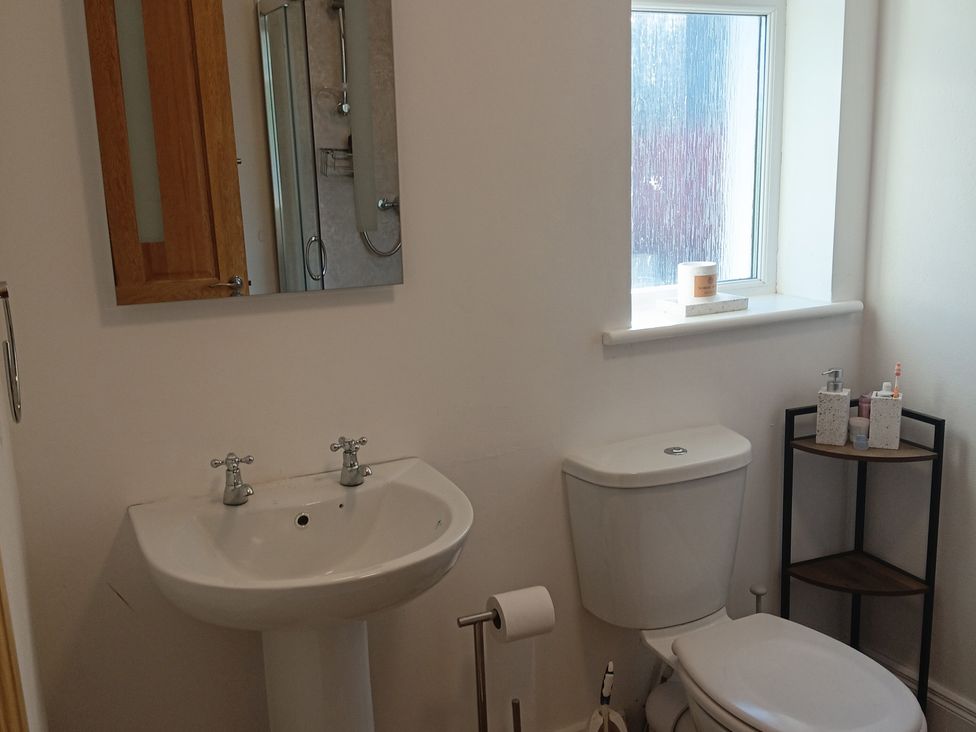 A bathroom with a sink and toilet at Sliabh League Mountain Lodge TEILEANN near Kilcar, County Donegal