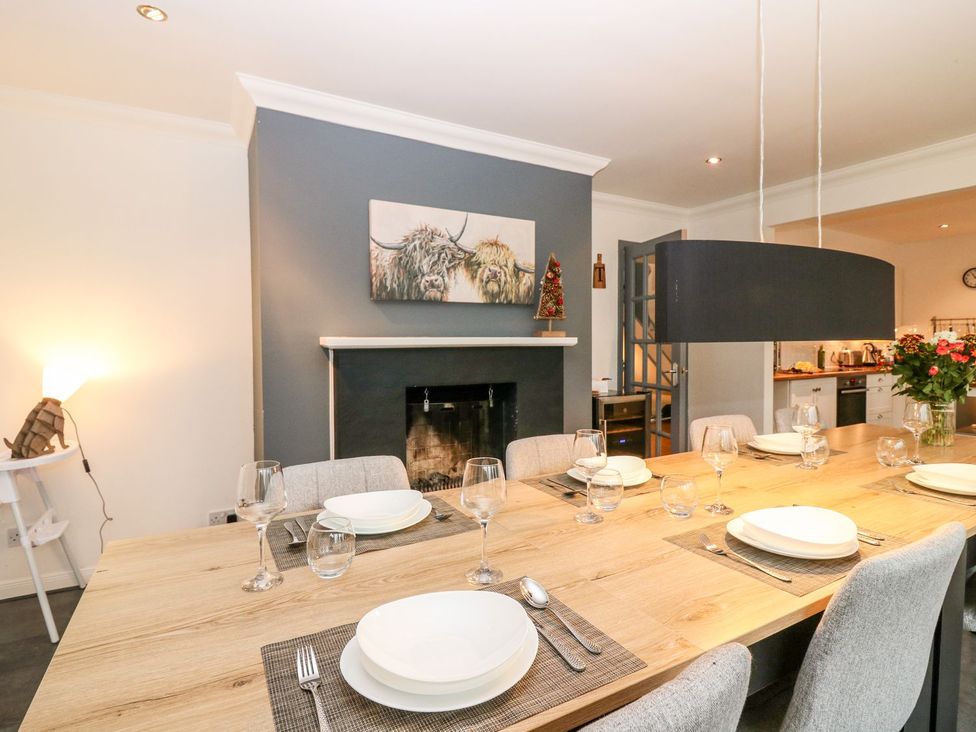 A dining room with a large table set at the Boat House in Aberdeen