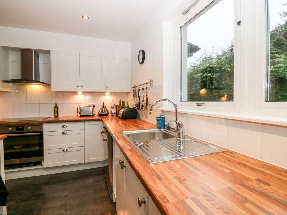 A kitchen with a sink and appliances at Boat House in Aberdeen