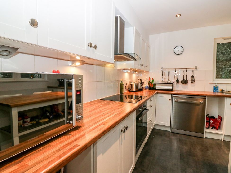 A kitchen with appliances and utensils at Boat House in Aberdeen